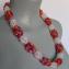 010 halssieraad acryl bicones transparant wit, rose, lila,oranje,rood vierkanten afgewisseld met rechthoeken