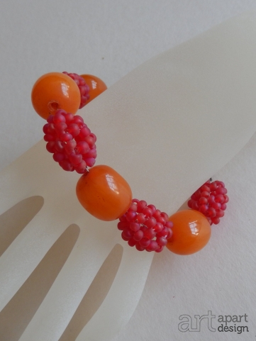 008a armband framboos met oranje harskralen