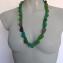 011 halssieraad pegels in diverse kleuren groen