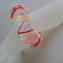 002a-armband kunststof buis rood, transparant wit, oranje en roze en rood