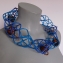 131 halssieraad blauw met pepers